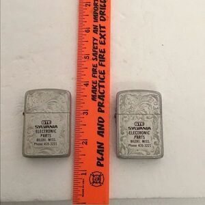 Pair of vintage PARK Venetian embossed advertising lighters